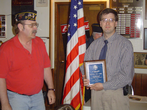 Troy accepting the Rice American Legion Officer of the Year Award in 2004