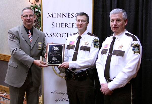 Troy Heck receiving his 2013 Minnesota Sheriff's Association Supervisor of the Year Award
